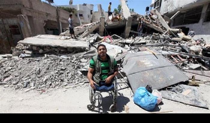 Momen Faiz, il fotografo disabile che racconta la Palestina al mondo