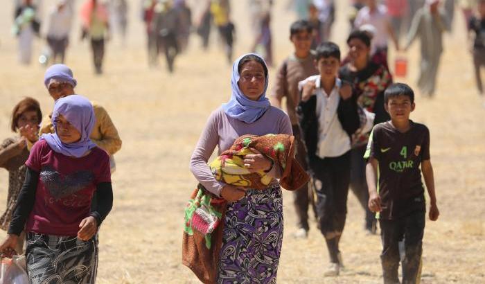Gli Yazidi in fuga durante l'offensiva dell'Isis