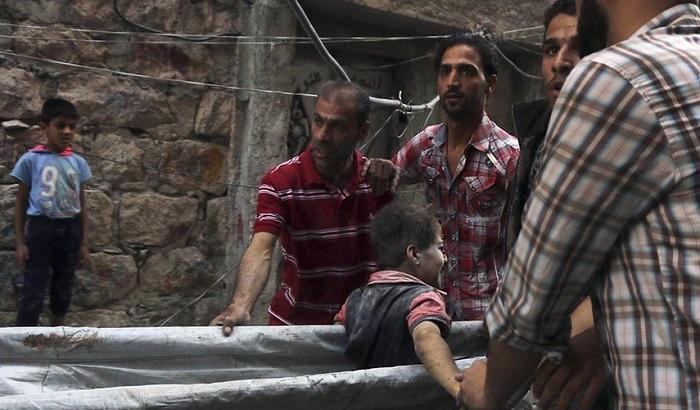 033318-siria-raid-su-aleppo-immagine-d-archivio Siria, raid su Aleppo - immagine d'archivio