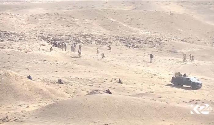 Curdi in azione contro i miliziani dell'Isis