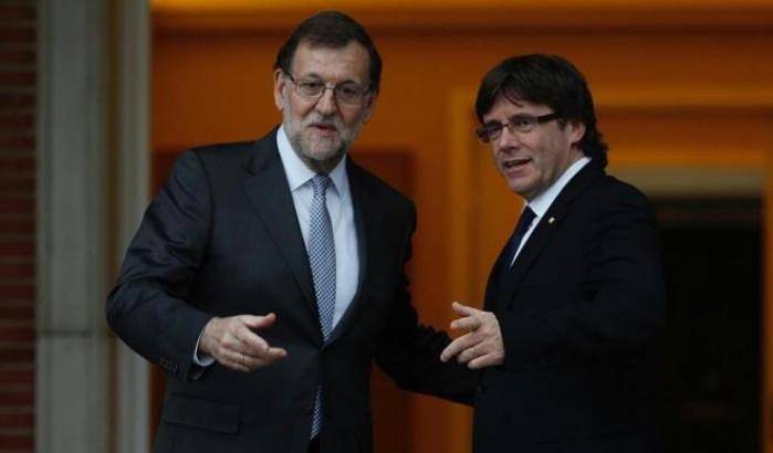 Rajoy e Puigdemont prima della rottura