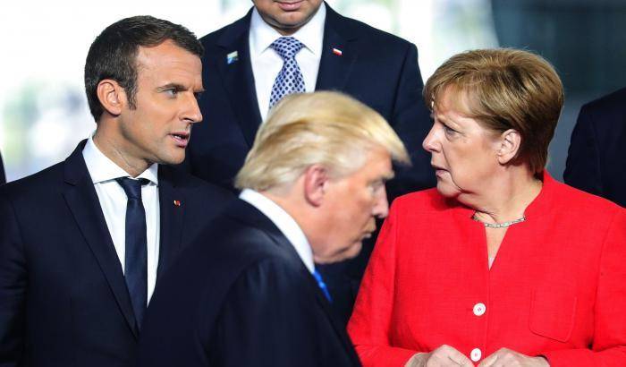 Macron e Merkel, Trump al centro