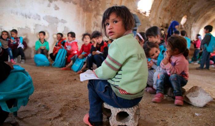 Bambini in un campo profughi in Siria